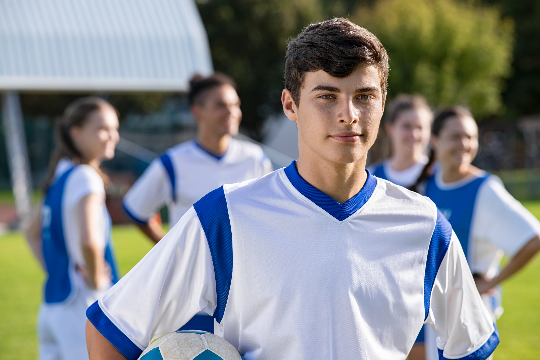 A teenager in sports gear.
